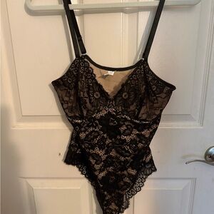 Black Lace Sheer Bodysuit new size L.